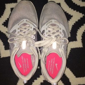 pink and grey nike strike size 6